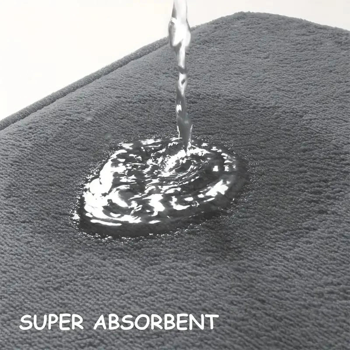 Super absorbent bathroom mat showing waterproof surface protection.