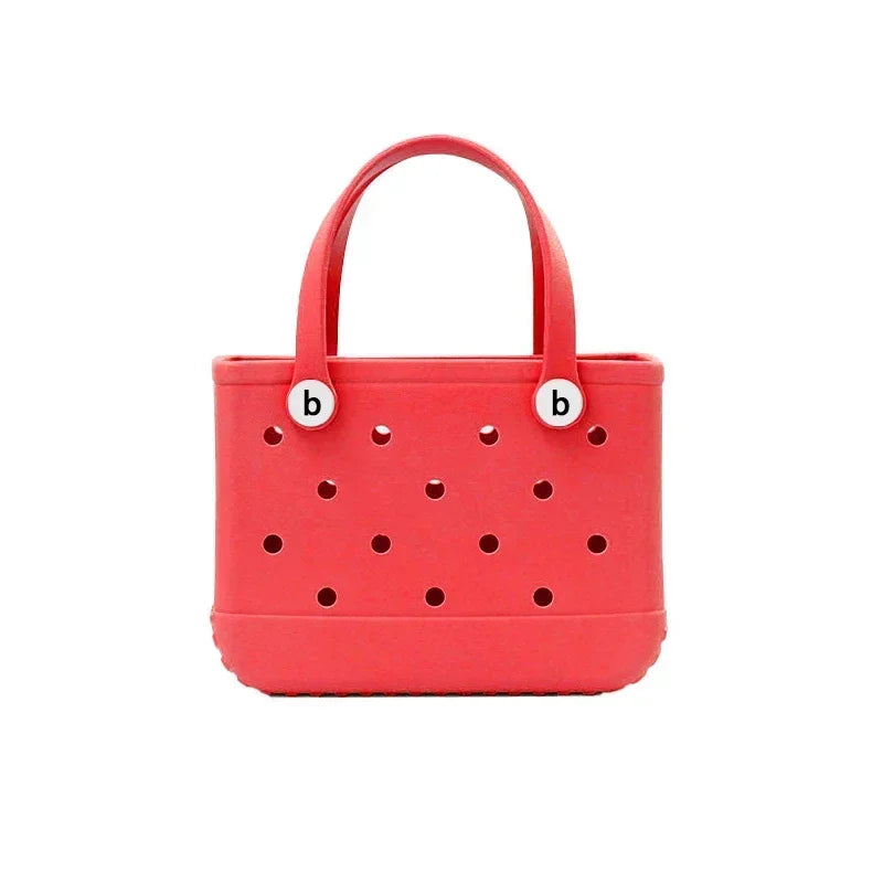 Red handbag with perforated design and 'b' logo on a white background
