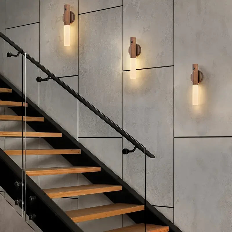 Modern wall-mounted LED night light with polished finish and acrylic base