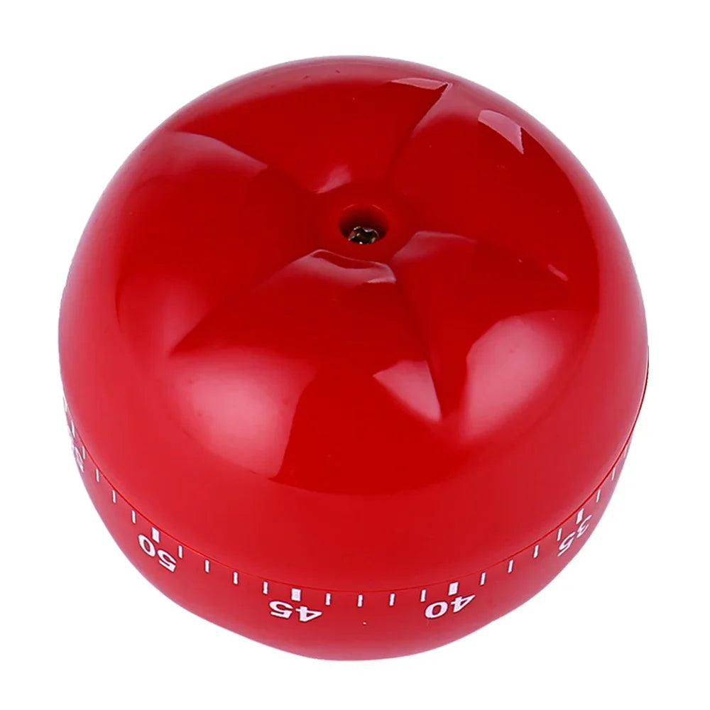 Bottom view of red tomato-shaped mechanical timer