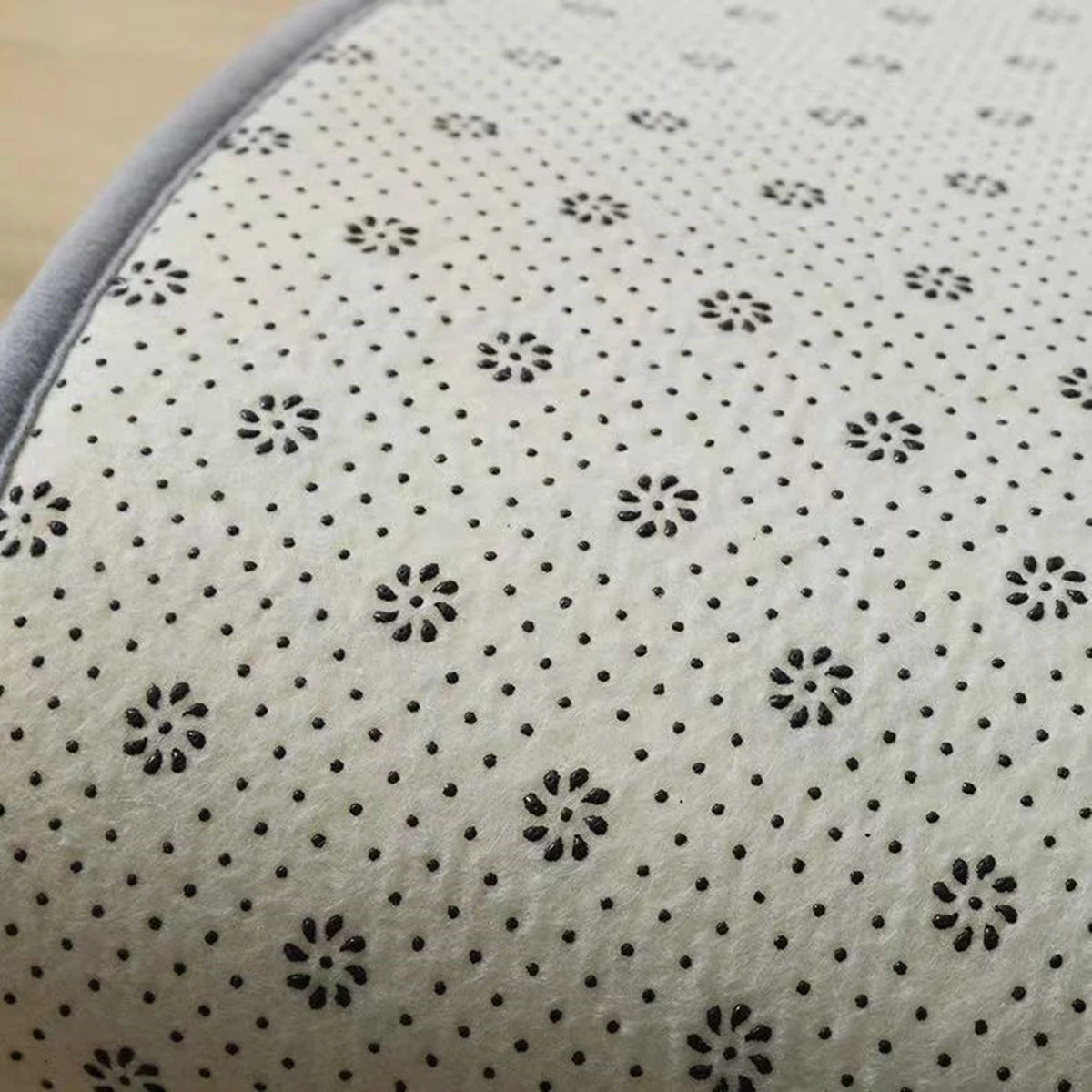Anti-slip backing design of bathroom mat for safe use.