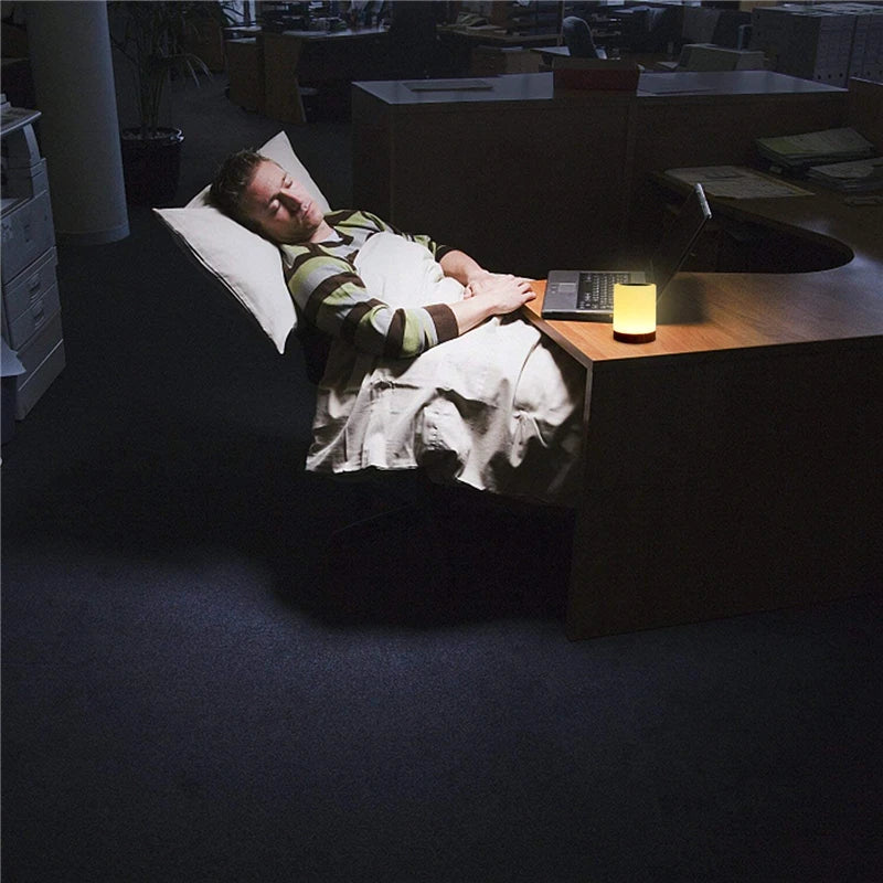 Touch sensor bedside night light used for nighttime reading.