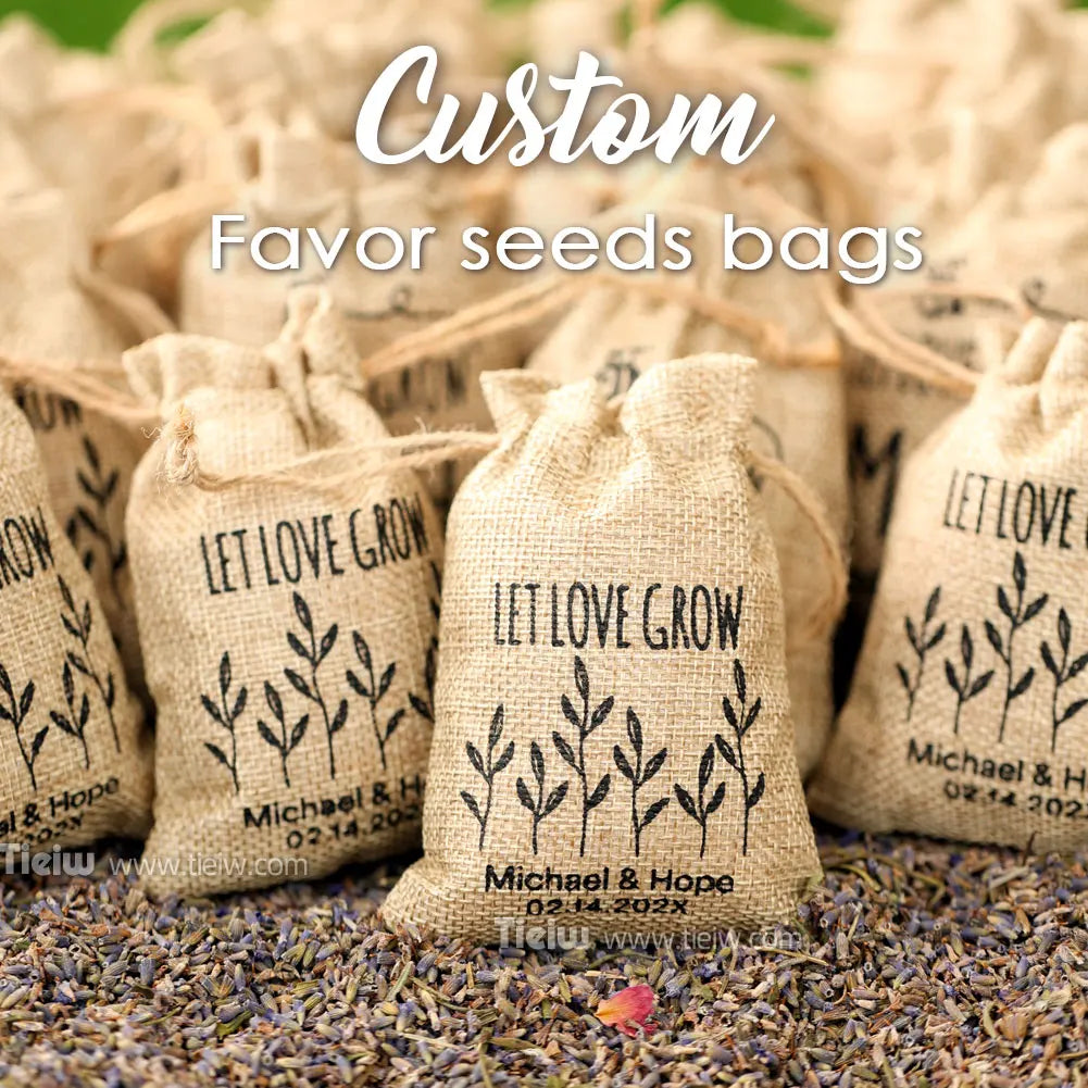 Custom favor seed bags with 'Let Love Grow' text on a bed of lavender flowers.