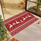 Red Christmas rug with reindeer and snowflake pattern placed in living room near Christmas tree and gifts.
